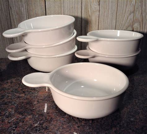 Mix the ingredients, pop into the microwave and serve all with one bowl. . Corningware bowl lids